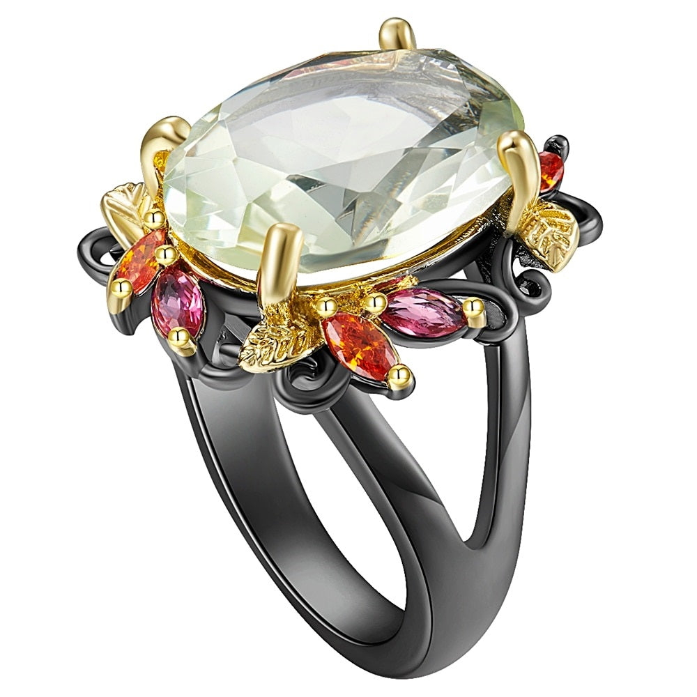 Fleurige ring met grote groene siersteen