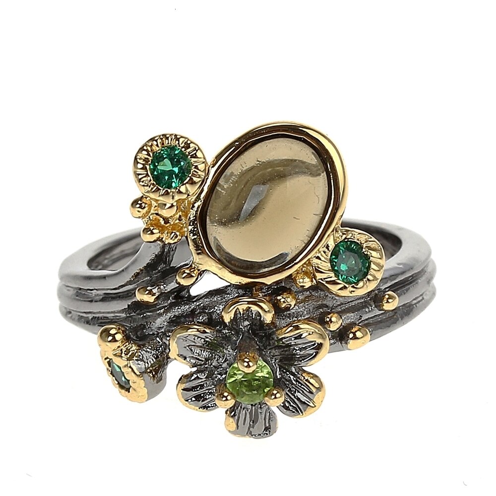 Ring met gele en groene sierstenen