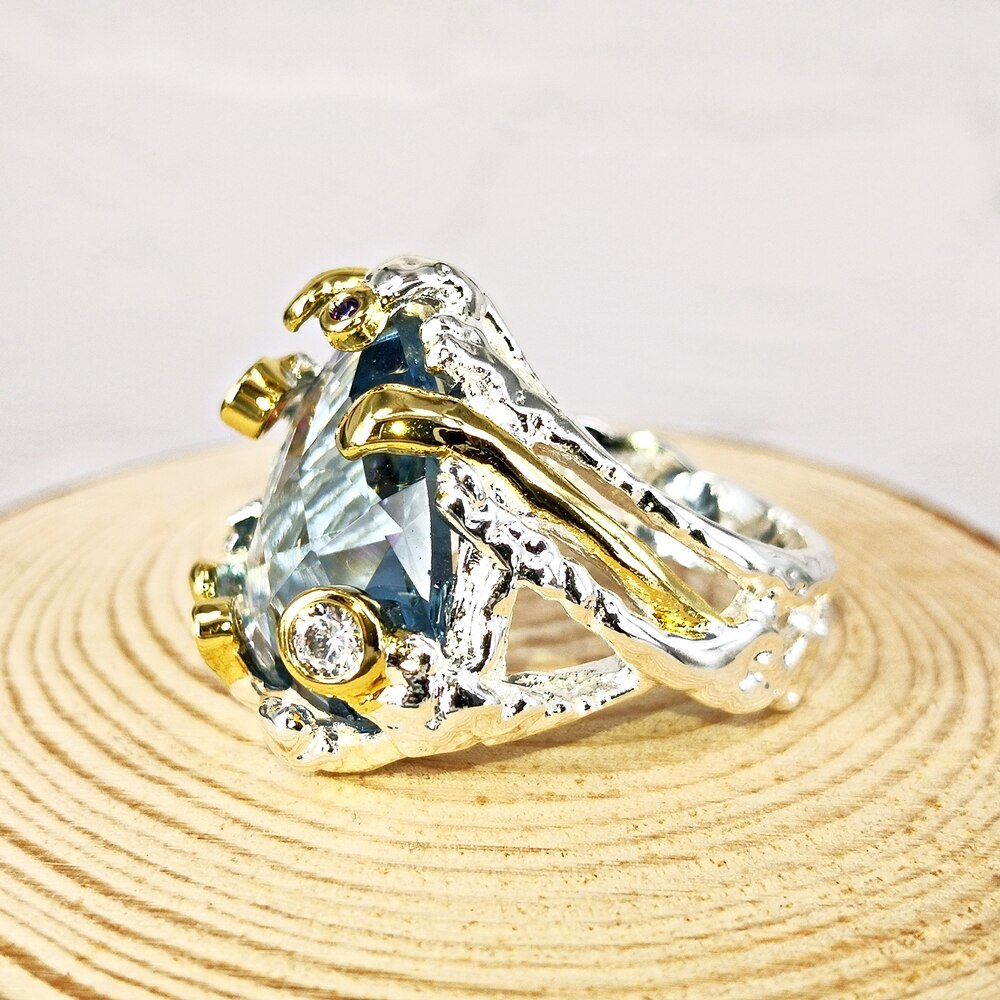 Ring met grote blauwe siersteen