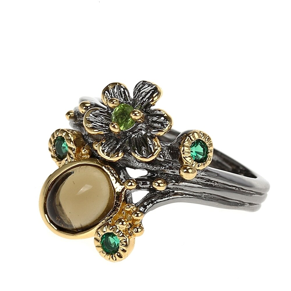 Ring met gele en groene sierstenen