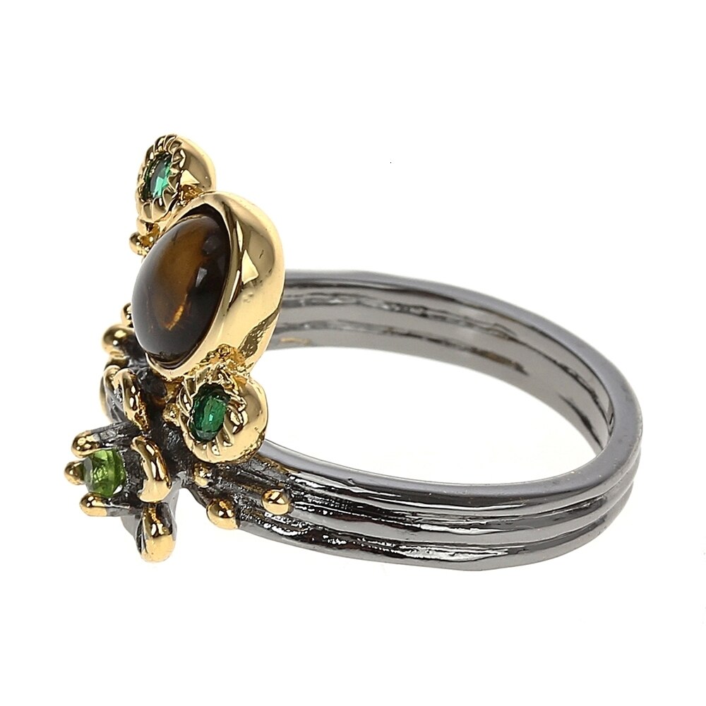 Ring met gele en groene sierstenen