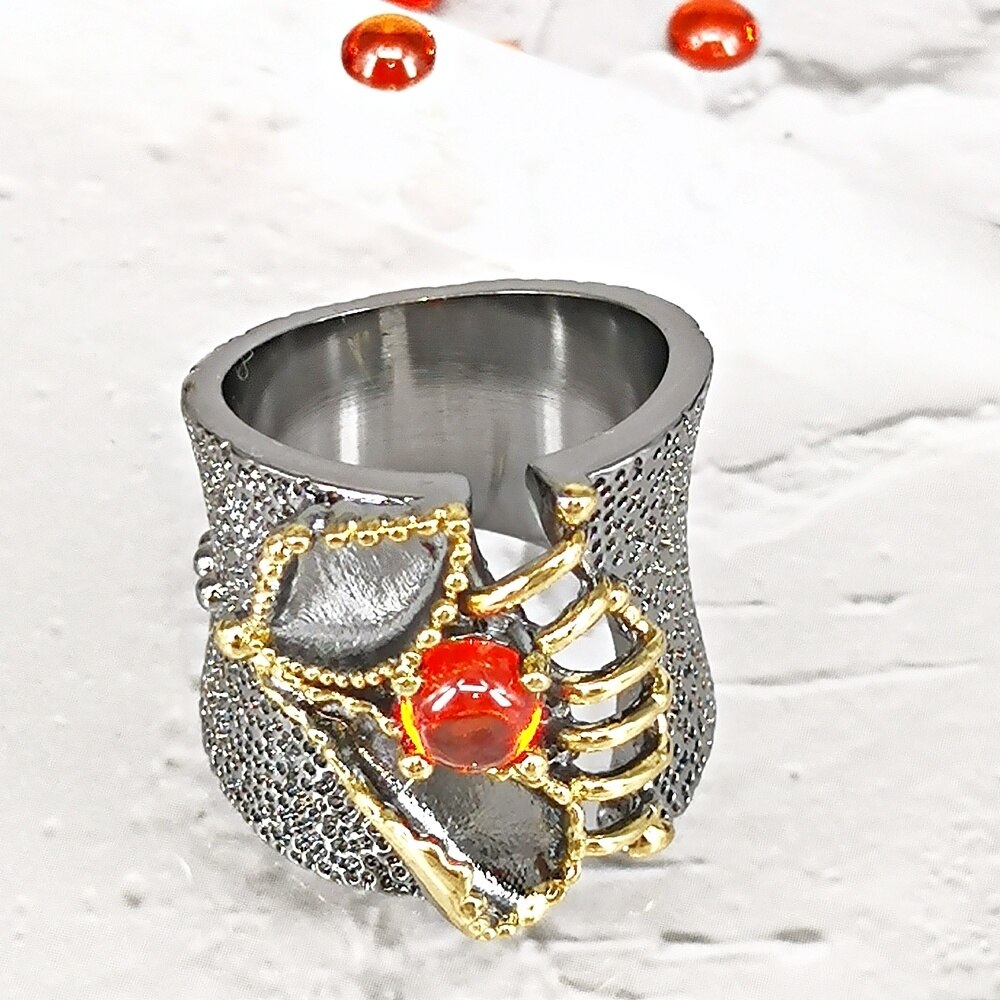 Opvallende ring met oranje siersteen
