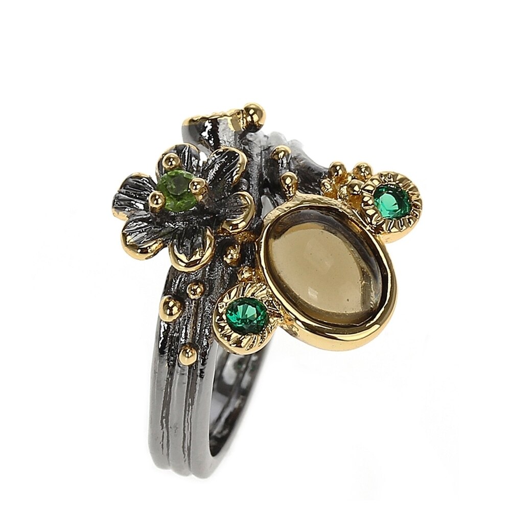 Ring met gele en groene sierstenen