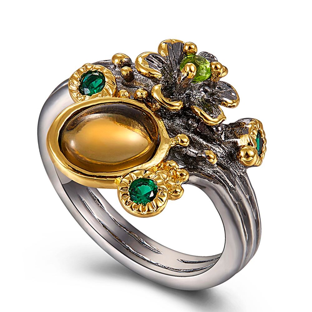 Ring met gele en groene sierstenen