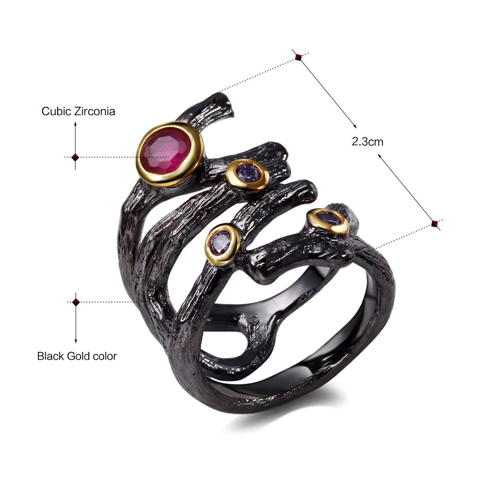 Gothic ring met kleine rode sierstenen