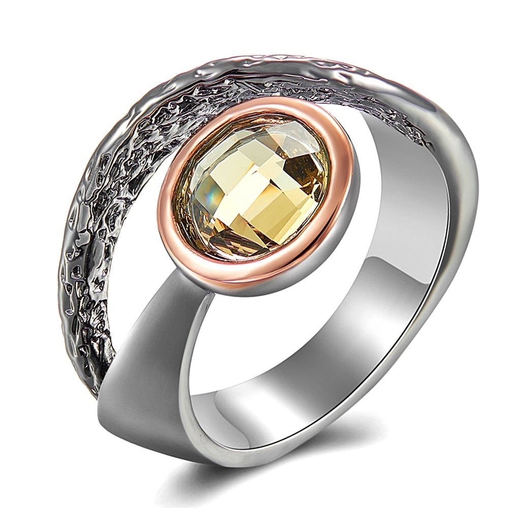 Eenvoudige ring met licht gele siersteen