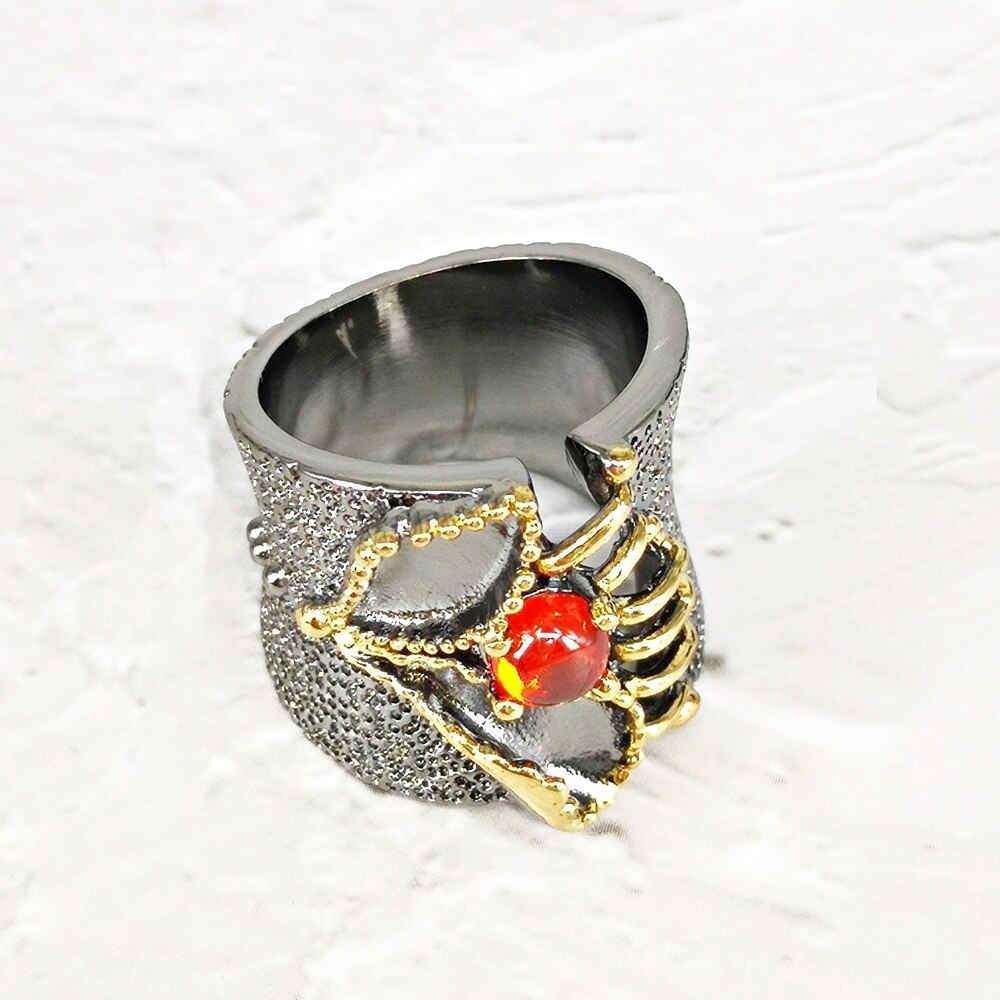Opvallende ring met oranje siersteen