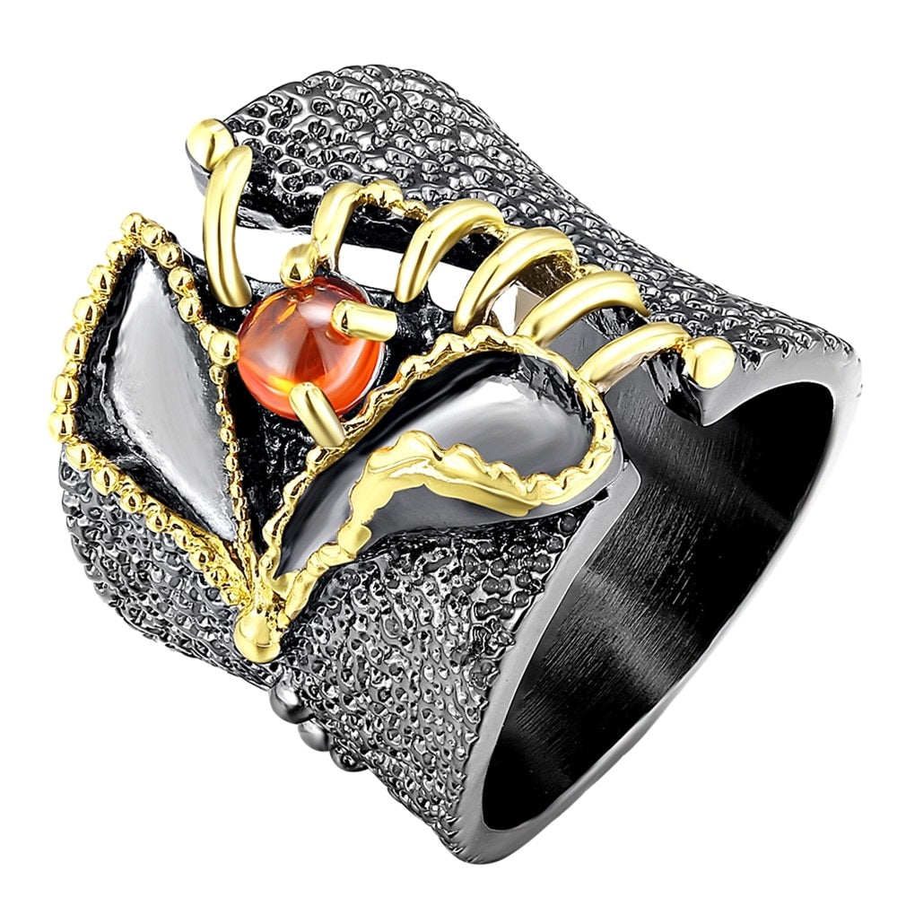 Opvallende ring met oranje siersteen