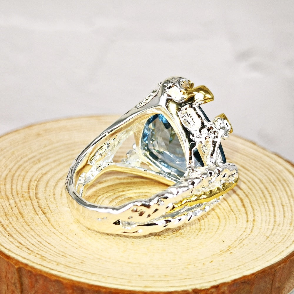 Ring met grote blauwe siersteen
