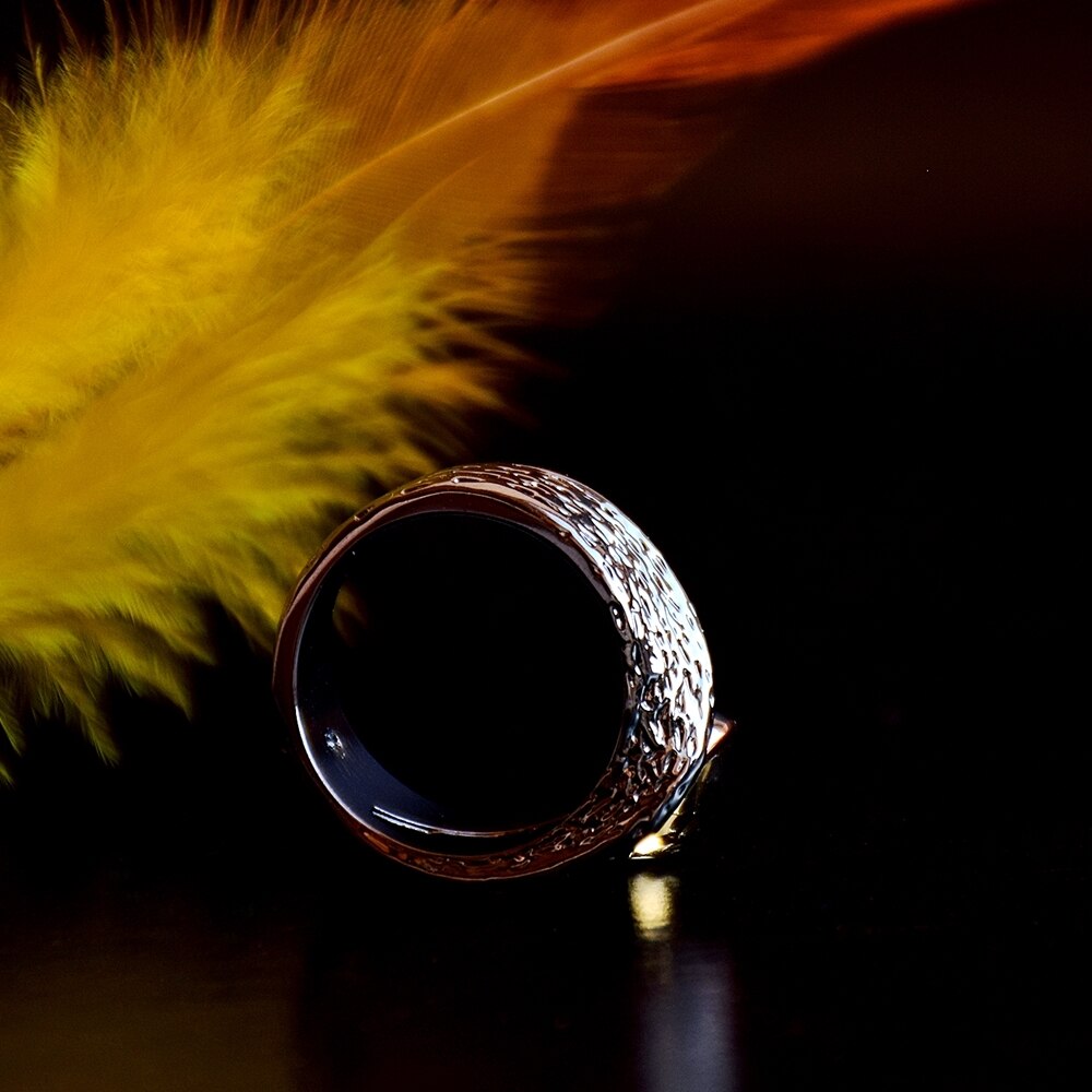 Eenvoudige ring met licht gele siersteen