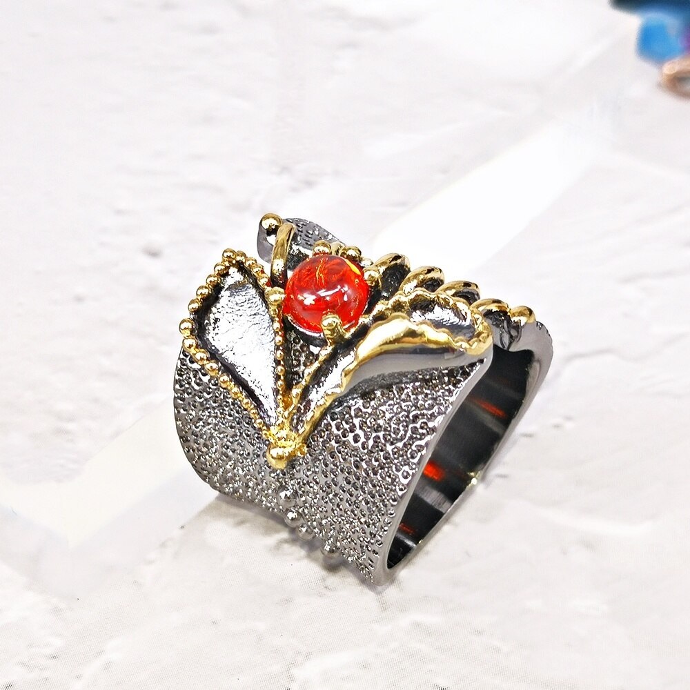Opvallende ring met oranje siersteen