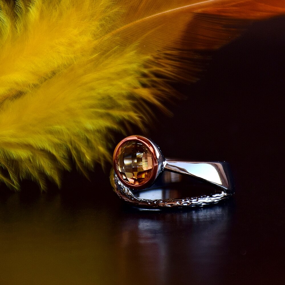 Eenvoudige ring met licht gele siersteen