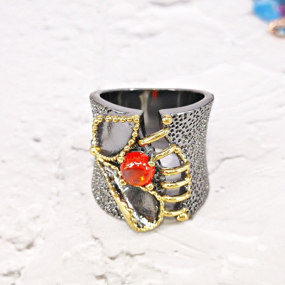 Opvallende ring met oranje siersteen