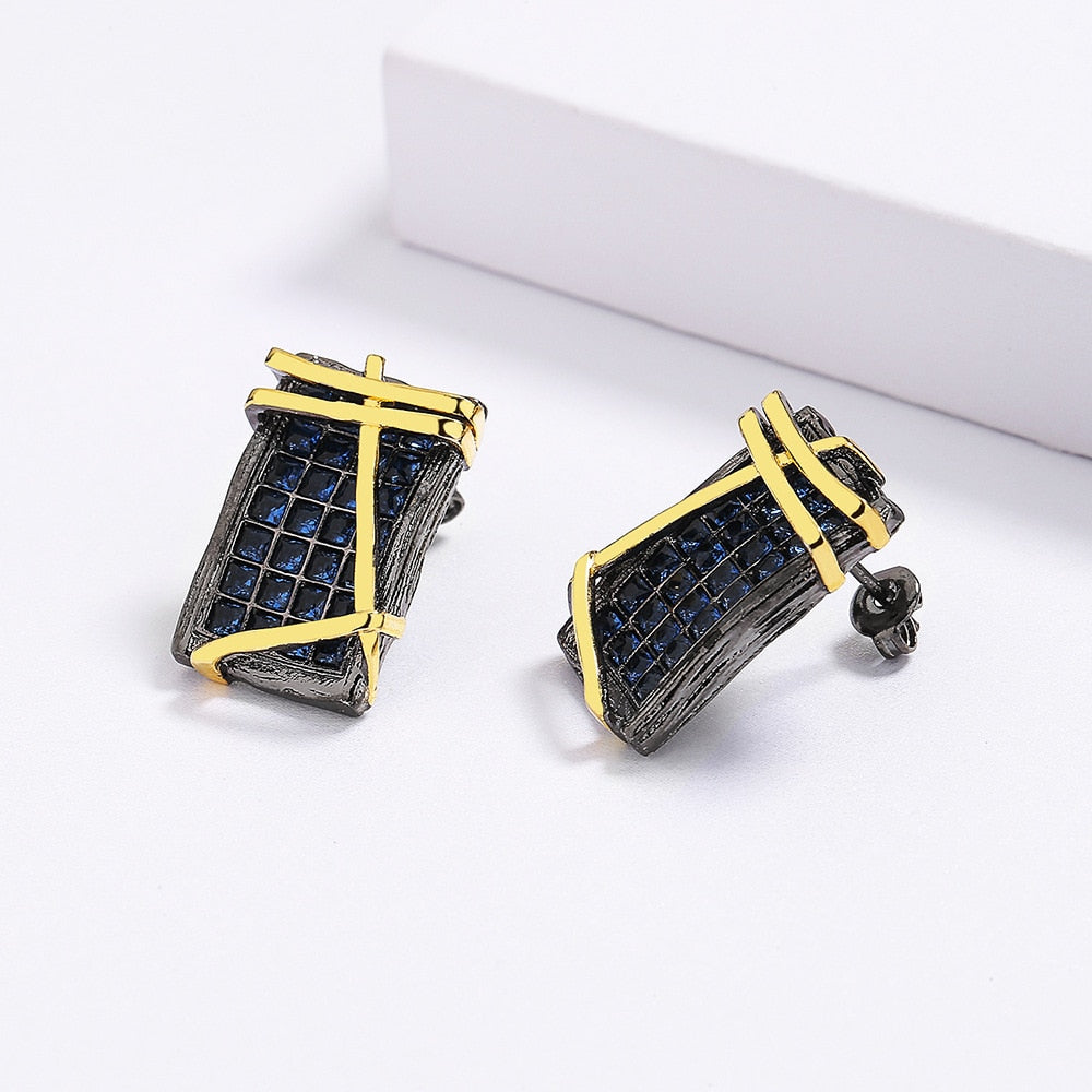 Geometrische oorbellen met blauwe sierstenen