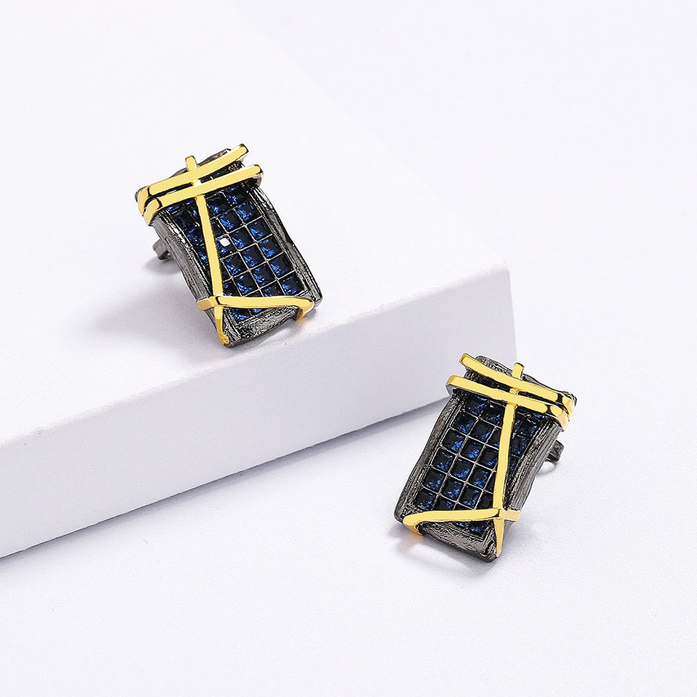 Geometrische oorbellen met blauwe sierstenen