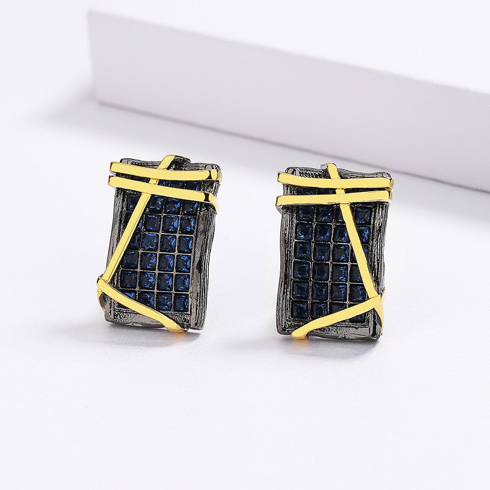 Geometrische oorbellen met blauwe sierstenen