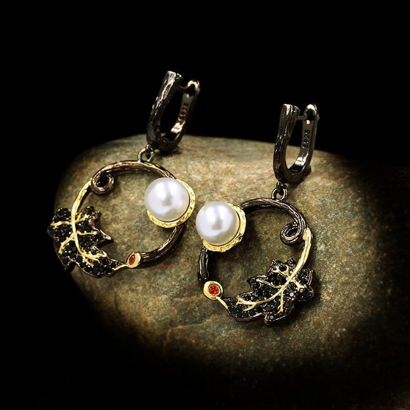 Retro leaf earrings with a white pearl