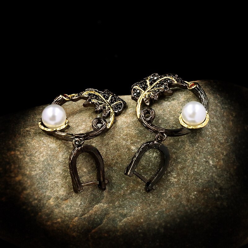 Retro leaf earrings with a white pearl