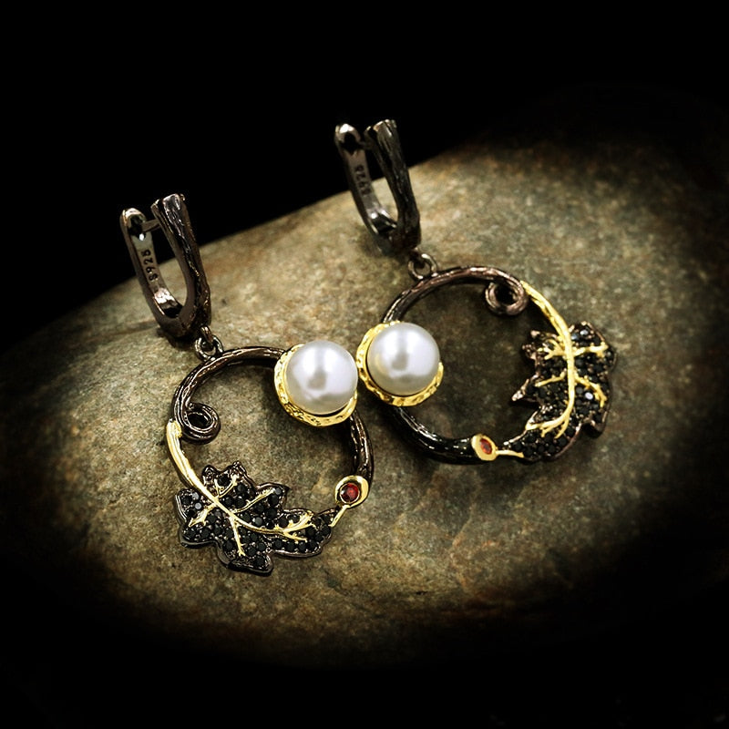 Retro leaf earrings with a white pearl