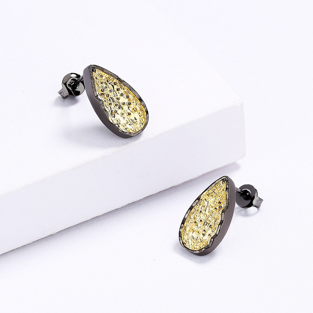 Golden water drop shape earrings