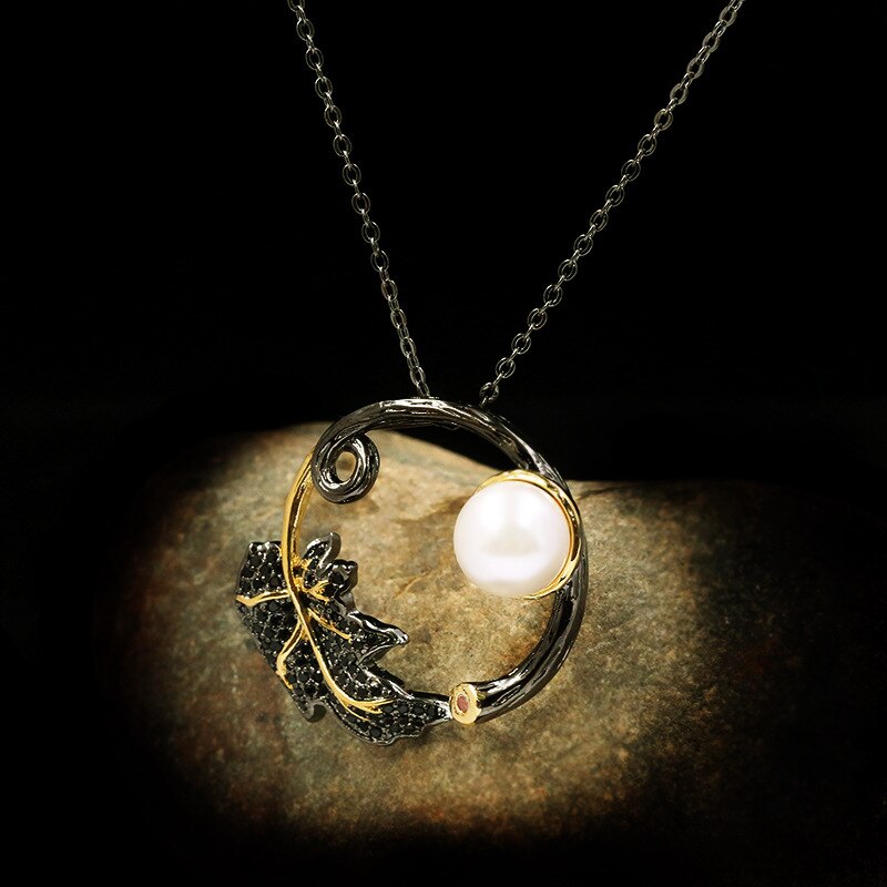 Retro leaf necklace with a white pearl