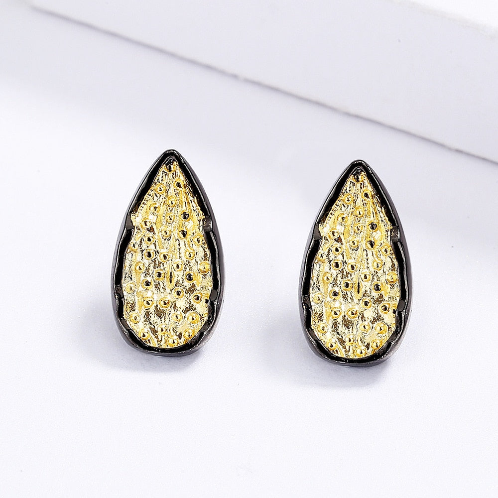Golden water drop shape earrings
