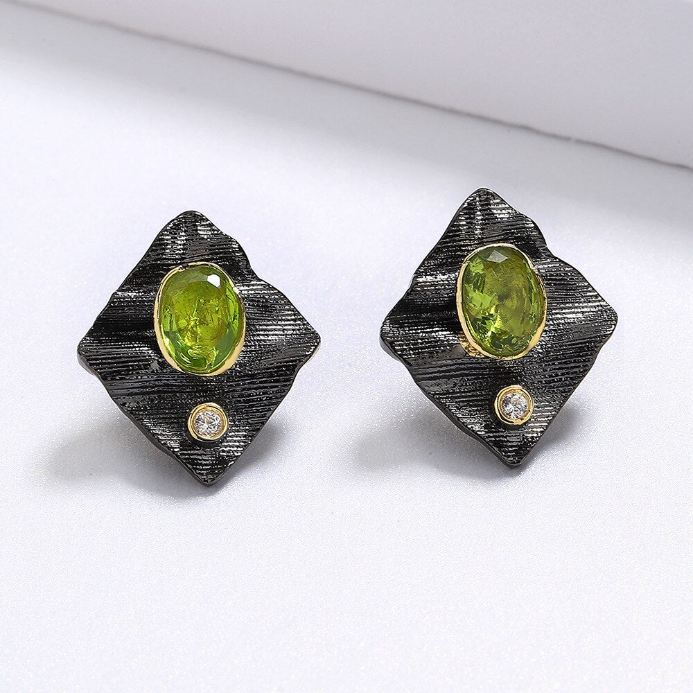 Rectangular earrings with green gem