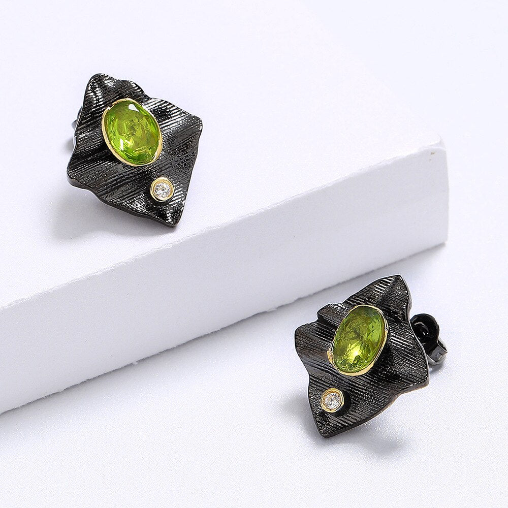 Rectangular earrings with green gem